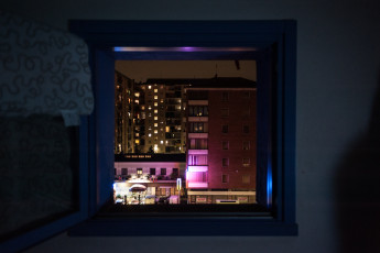 The view over the hotel – pizzeria in Giordano Bruno Street from one of the windows of the blue building. Turin.