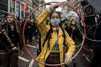 Thousands of rebels march on Oxford Street, one of London's shopping streets. Throughout the procession, numerous groups of street artists follow one another and alternate. London, October 12, 2019.